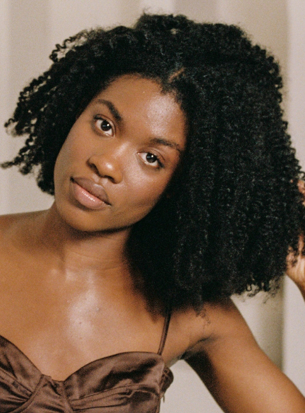 How to Detangle Curly Hair Without Losing Half of It Down the Drain